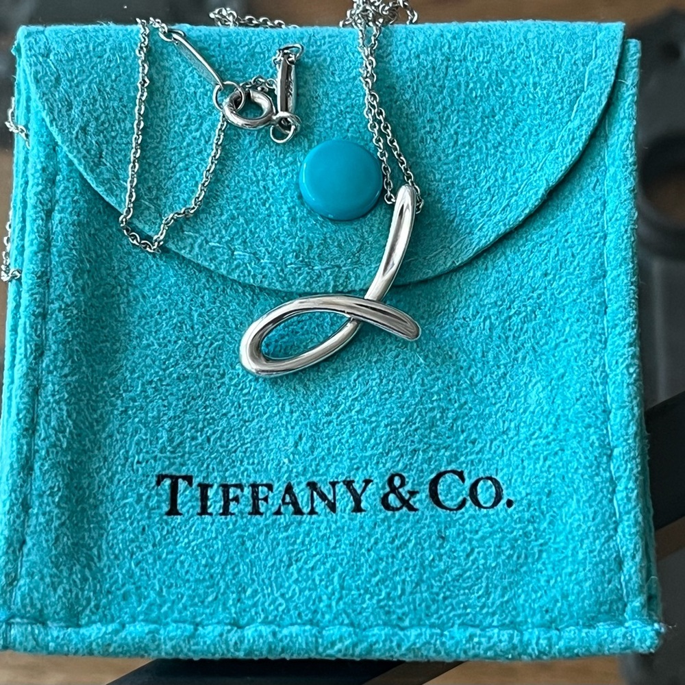 Tiffany & Co alphabet letter "J" pendant by Elsa Peretti
